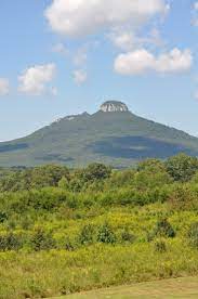 Pilot Mountain Nc It Just Sneeks Up On You When You Are Driving Out North Carolina Mountains Pilot Mountain North Carolina Blue Ridge Parkway North Carolina