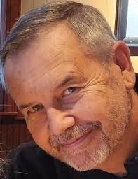 What kind of critter could be digging holes near the lake?