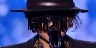 The performers are celebrities wearing elaborate head to toe costumes to conceal their identities from the host, panelists, audience, and other contestants. The Voice Monster The Masked Candidate Who Sows The Emotions Among The Coaches Teller Report
