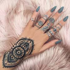 Girl With Henna Design On Her Wrist Wearing Rings Almond Nails Designs Nails Beautiful Nails