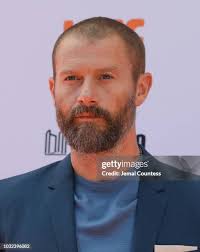 Michael Marra and John Schoenfelder attend the premiere of "Hold The...  News Photo