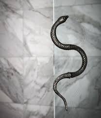 Artistic Snake Handle On Glass Shower Door In Hotel Suites At Maison De La Luz Unique Hotels Top Ho Shower Door Handles New Orleans Hotels Glass Shower Doors