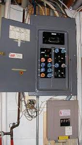 Changing the blown fuse in an old fusebox. Fuse Energy Education