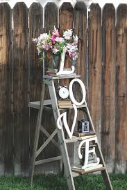 L O V E Letters On Ladder With Vintage Decor Vintage Wedding Ideas Rustic Vintage We Bridal Shower Rustic Vintage Rustic Wedding Decor Country Bridal Shower