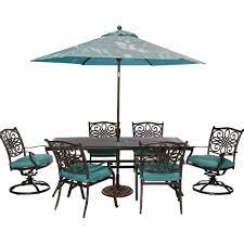 Check out dining sets based on seating capacity and the area of your patio. Cambridge Seasons 7 Piece Patio Outdoor Dining Set With Blue Cushions And Table Umbrella And Stand Seasdn7pcsw B Su The Home Depot Patio Dining Set Patio Umbrella Outdoor Dining Chairs