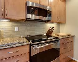 Maple cabinets that have red undertones, such as armstrong's bordeaux or holly from cabinets delivered, pair nicely with hardwood flooring in a mahogany stain. Contemporary Kitchen Remodel Maple Toffee Kitchen Remodel Kitchen Cabinets And Backsplash Kitchen Redesign