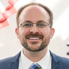 New year, new gig, new title, same old jacket!