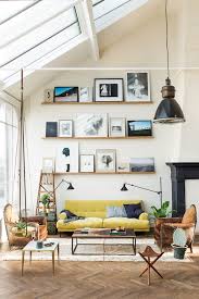 Simple Floating Shelves Give Plain Walls A Mountain Of Decorating Opportunities An Eye Catching Art Display Like This House Interior Interior Home Living Room