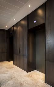 Elevator Lobby With Architrave And Trim Complementing The Wenge Panelling And Travertine Floor Ele Elevator Lobby Design Elevator Design Lobby Interior Design