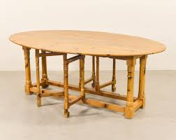 An adaptation of an early 18th century gate leg dining table for today's use. 1970 S Scandinavian Modern Pine Gateleg Table 135191