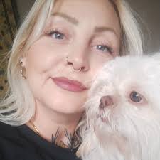 helpp my dog keeps crying and is NOT POOPING, earlier when i wash her butt  i felt in her butthole area that there is a big poop that she can't push  out.