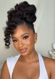 Can someone do a slick bun to my natural hair please ??