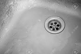 old dirty sink. plug hole of a kitchen