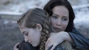 Is Katniss Related To Lucy Gray? What The New Hunger Games Book Reveals  About Their Connection