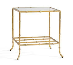 The tabletop of the table is also distressed, adding a little extra flair to this already stunning piece. One Day Deal Alert Gold Faux Bamboo Tables Emily A Clark