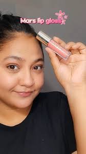 Mars lip gloss ✨️ , In the shade candy crush 😍 , These lip glosses are  very affordable & looks, so good 💗, The shine it give to my lips is  gorgeous 😍 , These are very lightweight & feels very ...