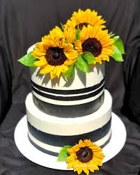 Sunflower cupcakes sunflower party sunflower baby showers sunflower weddings sunflower cake ideas cupcake decoration sunflower birthday parties how to make sunflower snacks für party. Envy S Sweets On Twitter Black And White Striped Sunflower Baby Shower Cake I Absolutely Love Working With Real Beautiful Flowers On Cakes One Tier Is Delicious Chocolate Cake And