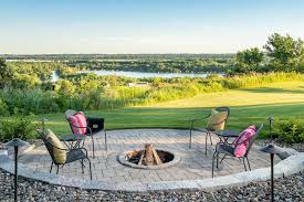 Random rectangular patio with capped stone seat wall. Patio Design And Construction Minneapolis St Paul Southview Design
