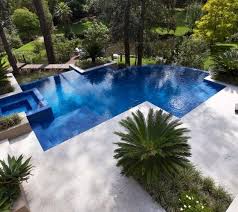 The Perfect Combination Of Modern Geometric Pool Design With An Infinity Edge Overlooking A Beautiful Pool Landscape Design Backyard Pool Designs Backyard Pool