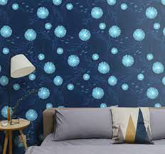 One of the most comforting wallpaper trends is introducing texture to the walls. Light Blue Flowers On Dark Blue Wallpaper Tenstickers
