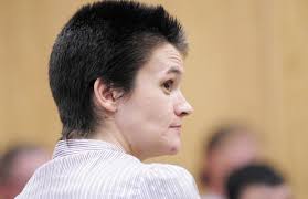 Woman tried to stab officer