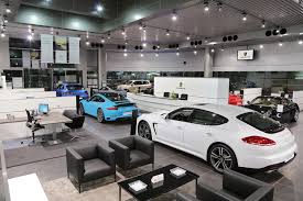 Pin By Eitidal Altabsh On Interior Decoration Porsche Showroom Porsche Experience Luxury Cars
