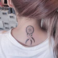 They consist of a willow hoop that contains netting or web with beads or feathers hanging from it. Back Dream Catcher Tattoo Small White T Shirt Rose Gold Long Hair Dream Catcher Tattoo Dream Catcher Tattoo Small Tattoos