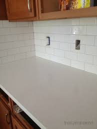 Caesarstone london grey with white cabinets. Kitchen Progress Subway Tile And Counters The Inspired Room