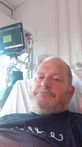 Can I ride attractions at Epic Universe with a stent and mild angina?