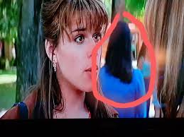 In the single scene from Scream 1996 where we see the "murderer" of Maureen  Prescott, Cotton Weary. They very clearly have him have the same haircut of  the actual killer. Small details