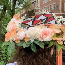This adorable photo from the instagram account of from local roots flower farm in utah inspired us to promote this idea of graduation floral crown headdresses for adults. Wearing Their Hearts On Their Graduation Caps The New York Times