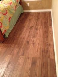 Home Decorators Collection Distressed Brown Hickory 12 Mm Thick X 6 1 4 In Wide X 50 25 32 In Length Laminate Flooring 15 45 Sq Ft Case 34074sq The Ho In 2020 Flooring Home Decorators Collection Distressed Brown