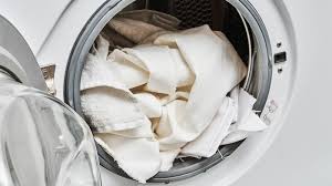 Locate the retaining tabs and/or screws that hold the top horizontal panel down. What Can You Do When Your Washing Machine Leaves Stains Howstuffworks