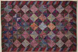 The simple log cabin quilt block intrigues beginners and expert quilters alike. Photo Gallery And Layout Tips For Log Cabin Quilts