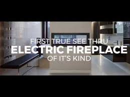 A clearion™ electric fireplace can be plugged in or hardwired directly into your electrical system creating a relaxing environment in two rooms. Napoleon Clearion See Thru Electric Fireplace Youtube