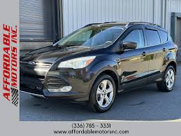 Image result for Tuxedo Black 2013 Escape