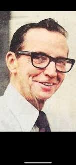 Bradley Harris provided this for publication in "Martinsville-Henry County  Memories". This is a crew of Stanley Furniture employees, circa 1931. The  supervisor was George R. Holesclaw. Identified here was Bradley's  grandfather, Daniel