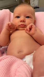 Is it normal for an 11-week-old baby to experience constipation followed by  vomiting? My baby was fine last week, with happy spit-ups and a few dirty  diapers a day. However, for the