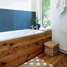 To build a wall around a bathtub. Dont Like The Look Of Your Bathtub Build A Box Around It Small Bathroom Remodel Natural Bathroom Rustic Modern Bathroom