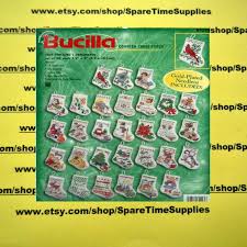 Counted cross stitch dishtowel pattern for huck dishtowels 14 count, aida, dmc thread, pdf pattern download. Handarbeit Bucilla More Tiny Stockings Ornaments Counted Cross Stitch Kit 2 5 X3 14 Count Bastel Kunstlerbedarf Totum Ca
