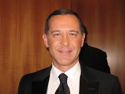 Dan Savage glitter-bombed; Wyoming coach resigns following anti-gay scandal 