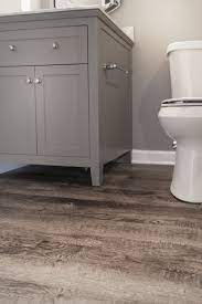 A touch of yellow would make any boring room a happy place ( case design/remodeling, inc.) 6 of 35. Loving This Lvt Flooring In Our Clients New Basement Bathroom Teamgreen Greenbase Basement Flooring Options Bathroom Flooring Options Best Bathroom Flooring