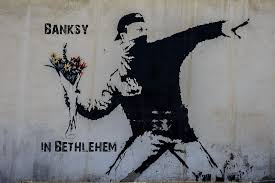 Besides, some of his works are reproduced with his stencil technique especially for the exhibition. Banksy In Bethlehem Banksy Street Art Bethlehem Palestine The Whole World Is A Playground
