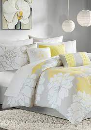 This is a contemporary, reversible quilt with a geometric style on the front side and a solid on the other side. Madison Park Lola Comforter Set Yellow Belk