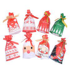 Our christmas design stand up candy bags are made in the usa of laminated polypropylene with foil accents. 5pcs Merry Christmas Candy Bag Santa Claus Elk Ribbon Bundle Pocket Food Cookie Plastic Gift Bags New Year Xmas Party Decoration Gift Bags Wrapping Supplies Aliexpress