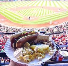 Nothing says summer baseball season like a fresh, juicy cob of corn to gnaw through during a really intense, close game. I Ate Baseball Game Food Hotdog Brie Cheese Crackers Pineapple Assorted Nuts And Popcorn