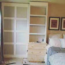 The shelves were cute but not very deep and didn't provide next we picked up some wood at home depot to create the spacers between the cabinets and two boards to create a top for the cabinetry. Master Bedroom Wainscotting Remodel Bedroom Guest Bedroom Remodel Bedroom Built Ins