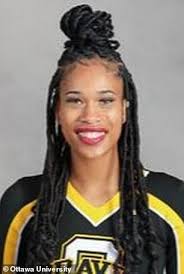 Black Kansas cheerleader says she was kicked off of her college team over  her long braids