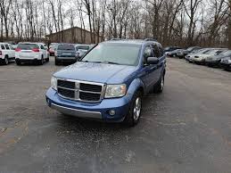 Image result for Deep Coral Red 2007 Durango