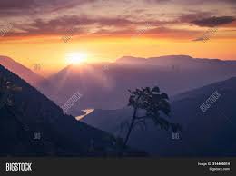 Images & pictures of mountains sunrises and sunsets wallpaper download 254 photos. Sunset Mountain Image Photo Free Trial Bigstock